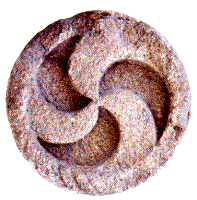 Esvástica grabada en piedra perteneciente a la cultura castreña, conservado en el Museo Arqueológico de Santa Tecla